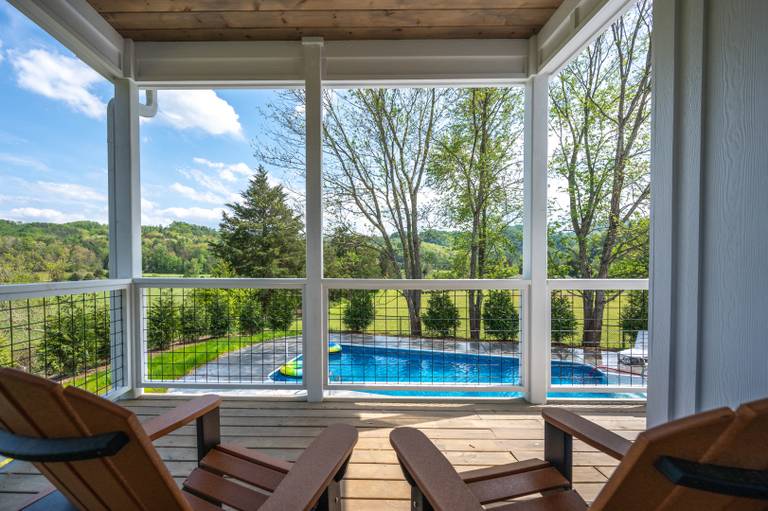 the farmhouse vacation rental pool from the deck