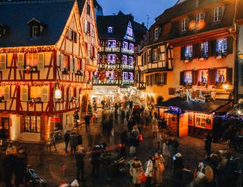 A European village street busy with holiday shoppers