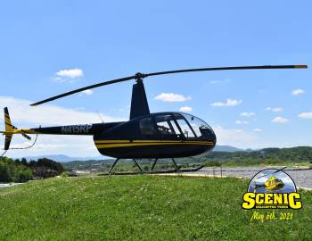 Photo of a Helicopter on a field 