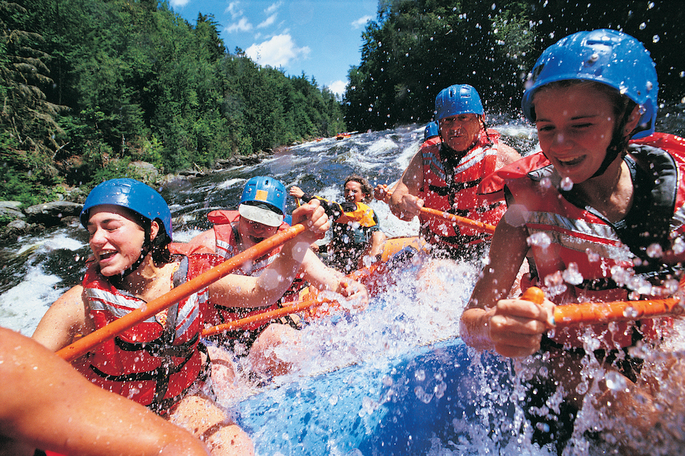 family on white water rafting trip